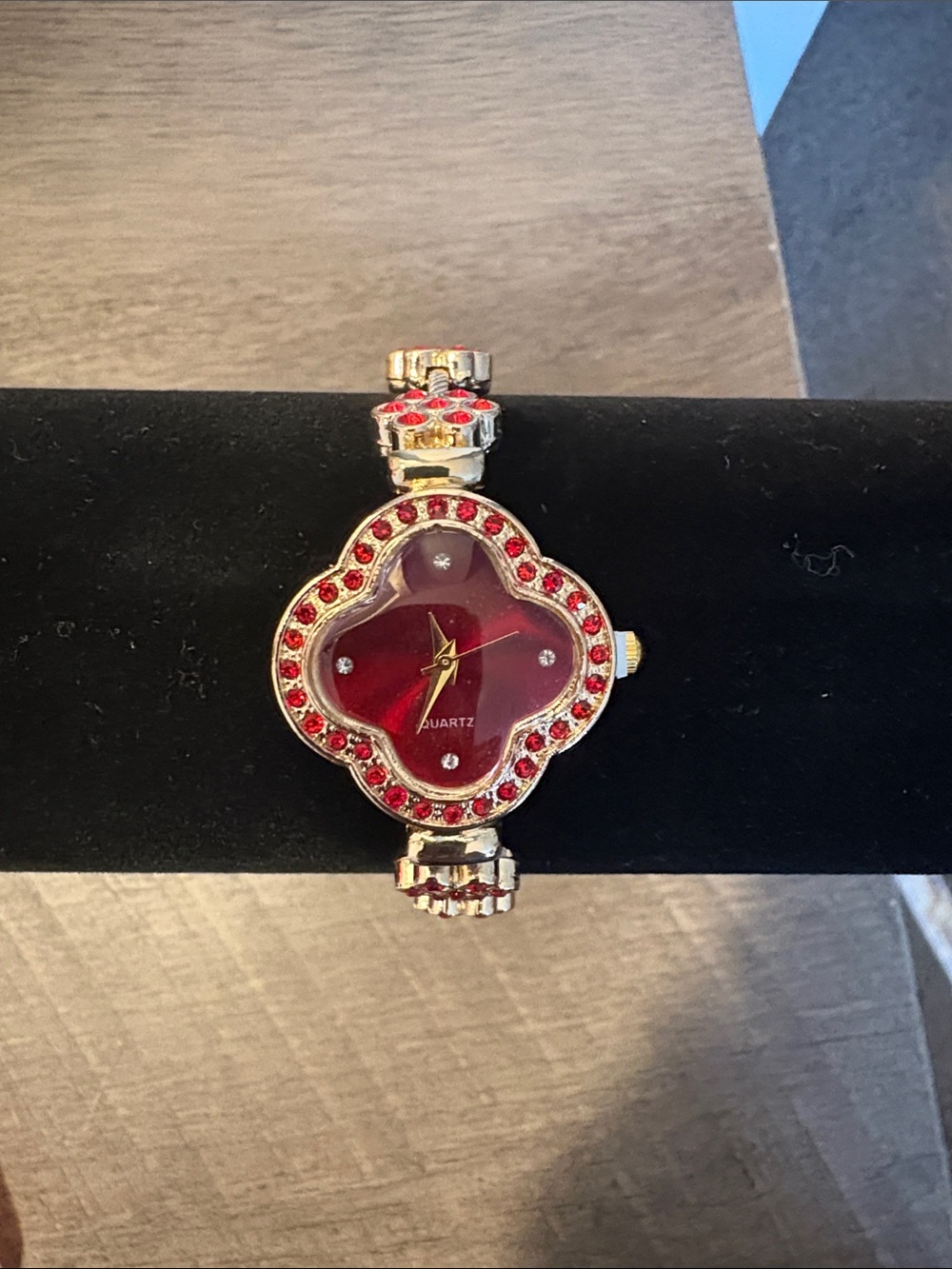 red jewel-style accents with clear rhinestone detailing